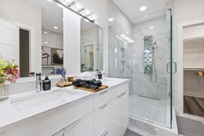 Shower, hair dryer, towels, soap