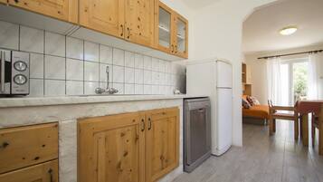 Apartment | Private kitchen | Fridge, dishwasher, coffee/tea maker