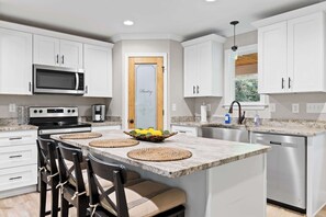 Fridge, microwave, dishwasher, coffee/tea maker