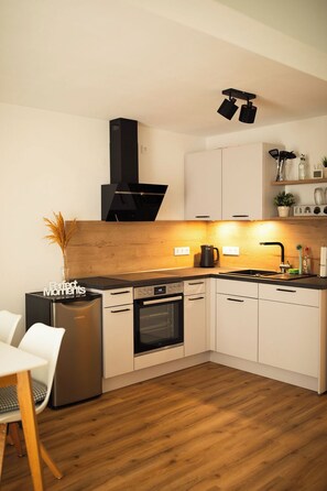 Refrigerador, horno, placa de cocina, lavavajillas