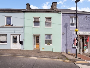 A two-story building with a shop on the ground floor and a residential unit above. - Clifden Nook 2 Apt w/ Fireplace (Clifden)