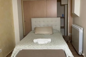 1 bedroom, desk, bed sheets