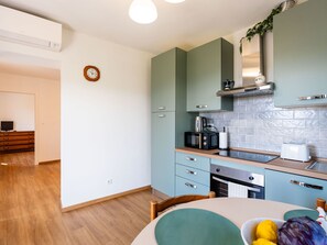 Fridge, microwave, oven, cookware/dishes/utensils