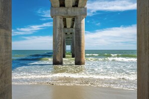 A unique view from beneath the pier—perfect for snapping photos, soaking up ocean breezes, or just taking it all in.