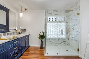 Shower, hair dryer, towels