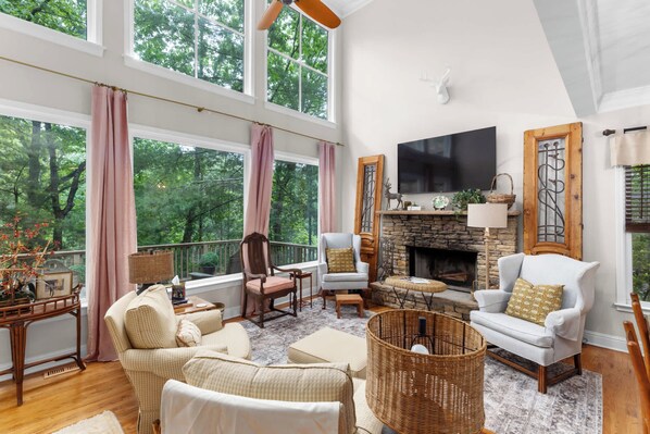 TV, fireplace, books, offices