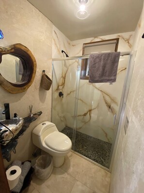 Shower, hair dryer, towels, soap