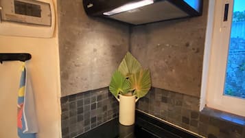 Fridge, microwave, stovetop, coffee/tea maker
