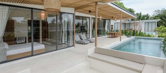 Tropical Poolside Retreat by Sea N' Rent