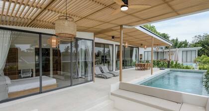 Tropical Poolside Retreat by Sea N' Rent