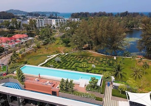 2 outdoor pools, pool umbrellas, pool loungers