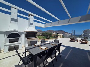 Outdoor dining - Avli Luxury Villas (Karpathos)