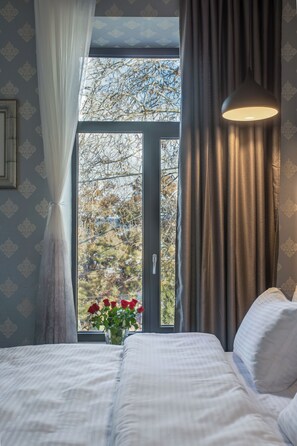Deluxe Double Room, Balcony, City View | In-room safe, blackout drapes, soundproofing, free WiFi