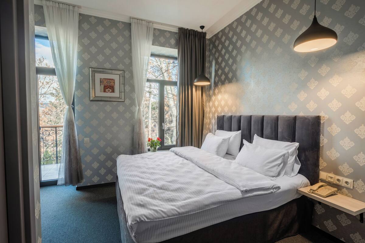 Deluxe Double Room with Balcony | Egyptian cotton sheets, premium bedding, memory foam beds, minibar