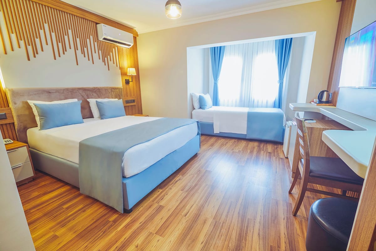 Desk, laptop workspace, free WiFi, bed sheets