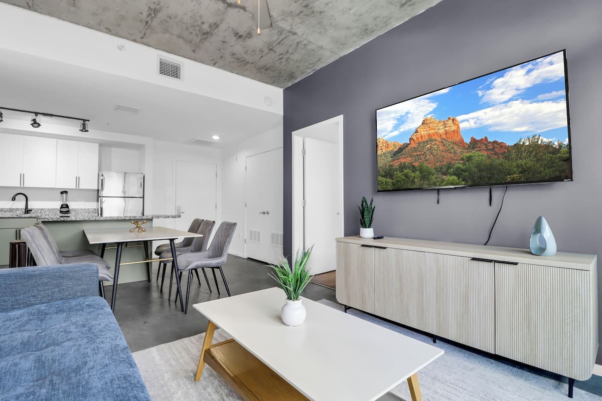 65-inch flat-screen TV with cable channels