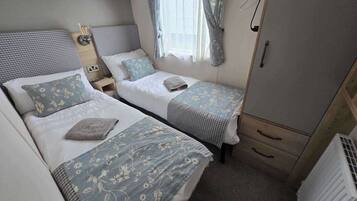 3 slaapkamers, een strijkplank/strijkijzer, gratis wifi, beddengoed