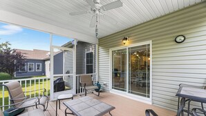 A covered patio with outdoor furniture, a ceiling fan, and a clock on the wall. - 10 Golden Eagle Dr, Ocean View, DE (Ocean View)