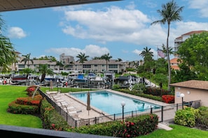 A heated pool - Island Escape: Walk to Beach, Pool & Canal Views (Marco Island)