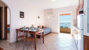 Premium Apartment, 2 Bedrooms, Sea View | Iron/ironing board, free WiFi