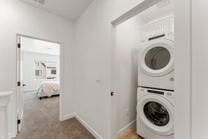 4 bedrooms, laptop workspace, iron/ironing board, cots/infant beds