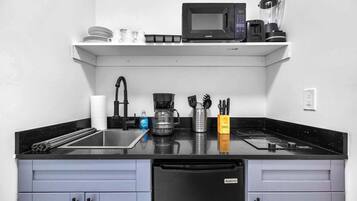 Fridge, microwave, stovetop, coffee/tea maker