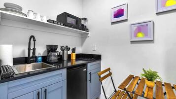 Fridge, microwave, stovetop, coffee/tea maker