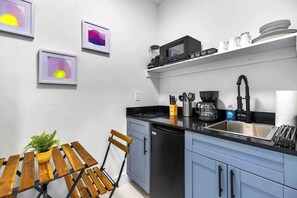 Fridge, microwave, stovetop, coffee/tea maker