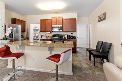 Spacious 5-bedroom house with AC, WiFi in charming Riverdale 3 Spa-Like Baths