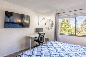 2 bedrooms, desk, iron/ironing board, travel crib