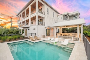 A two-story house with a pool, outdoor seating, and a covered patio. - Tiny Bubbles 30A|Easy Beach Access|Private Pool|Golf Cart (Santa Rosa Beach)
