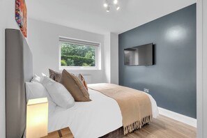 2 chambres, fer et planche à repasser, Wi-Fi, draps fournis