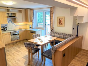 Apartment, Balcony, Mountain View | In-room dining - Siegmundshof Hotel Garni (Saalbach)