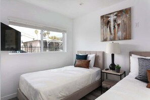 4 dormitorios, tabla de planchar con plancha, wifi y ropa de cama