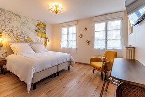 4 slaapkamers, een strijkplank/strijkijzer, gratis wifi, beddengoed