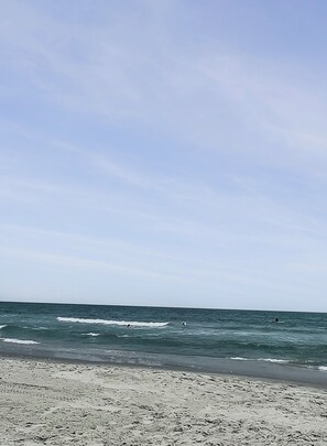 On the beach, sun loungers
