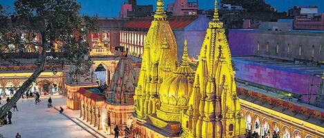 A temple with multiple spires and a large open courtyard.