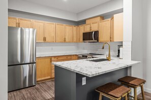 Fridge, microwave, oven, stovetop - Whispering Pines Retreat ~ Hot Tubs/Outdoor Heated Pool (Canmore)
