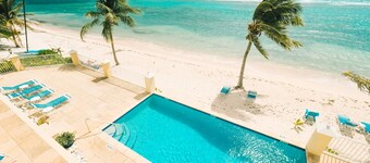 Spacious 2-bedroom ocean view condo in enchanting Bodden Town, including a car!