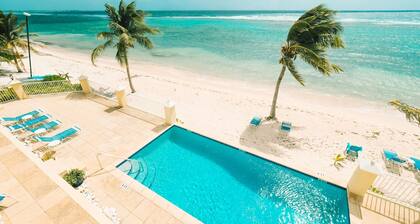 Spacious 2-bedroom ocean view condo in enchanting Bodden Town, including a car!