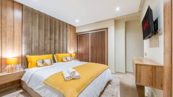 2 habitaciones, tabla de planchar con plancha y cuna de viaje