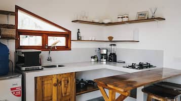 Fridge, stovetop, coffee/tea maker, cookware/dishes/utensils