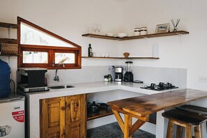 Fridge, stovetop, coffee/tea maker, cookware/dishes/utensils