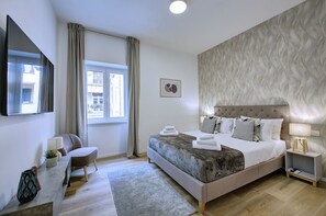 2 dormitorios, tabla de planchar con plancha, wifi gratis y ropa de cama