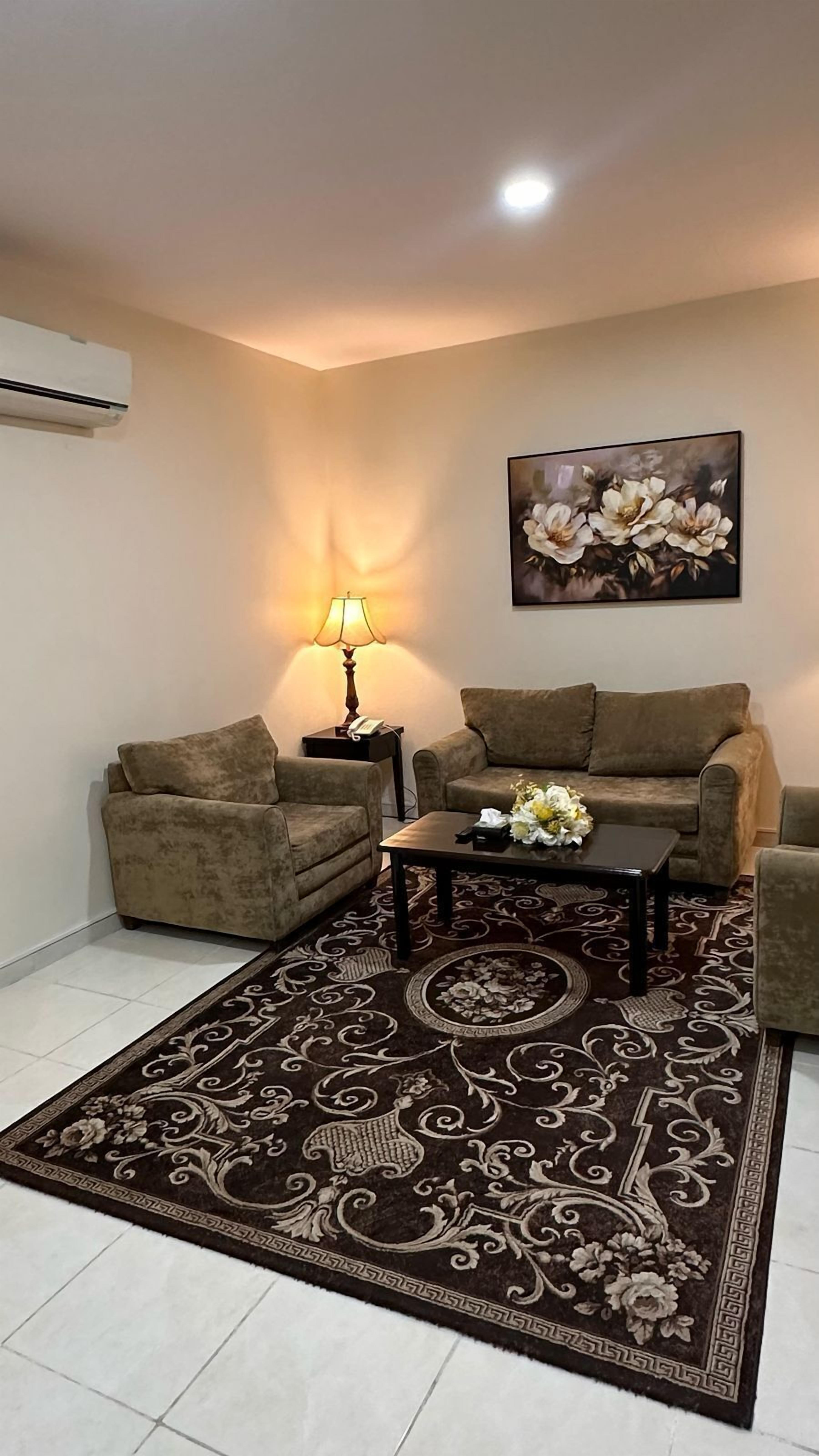 Family Apartment | Living area | 42-inch LCD TV with satellite channels