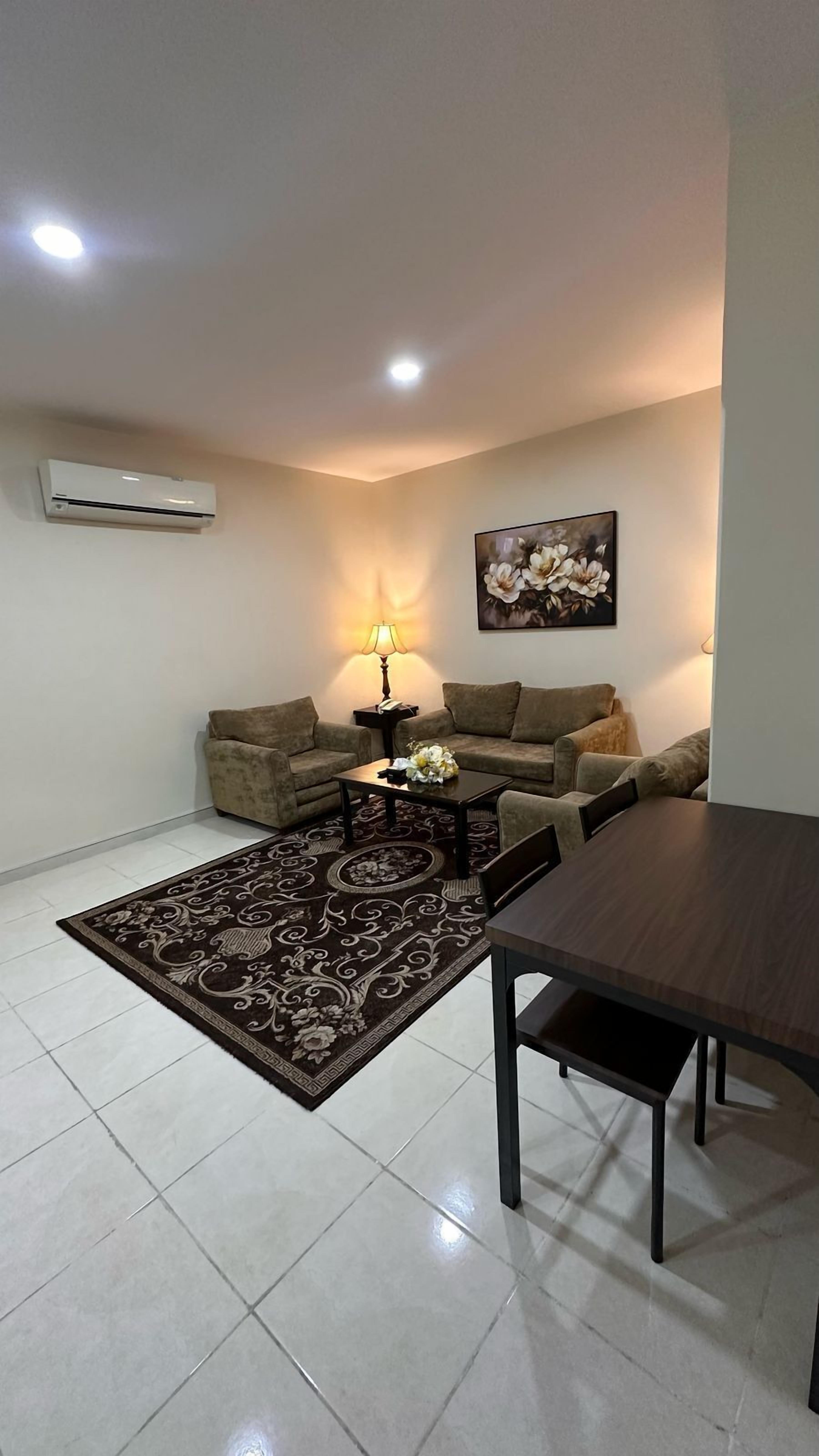 Family Apartment | Living area | 42-inch LCD TV with satellite channels