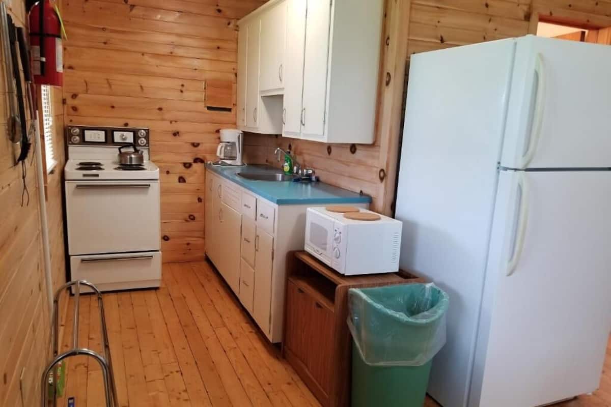 Cottage, Balcony, Ocean View | Private kitchen | Fridge, microwave, oven, stovetop