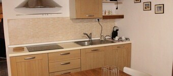 "Lovely Home" Cozy vacation home with Wi Fi and space in the house for bikes.