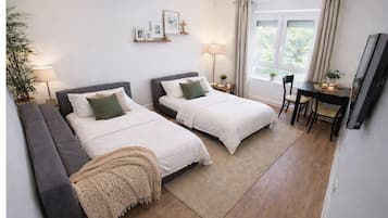 1 habitación, tabla de planchar con plancha, wifi y ropa de cama