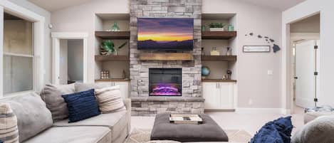 Smart TV, fireplace, ping pong, books